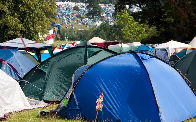 Music festival tents in a field - Can You Bring A Gazebo to Secret Garden Party?